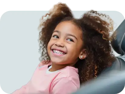 bambina-prima-visita-dentista-sorridente-roma